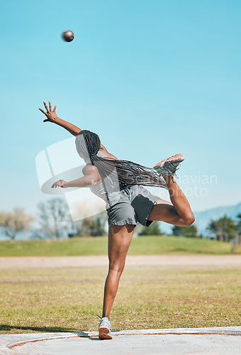 Image of Shot put, woman and athlete throw in competition, challenge or training for field event with metal or steel weight. Throwing, ball or female in athletics sports, games or outdoor olympics tournament