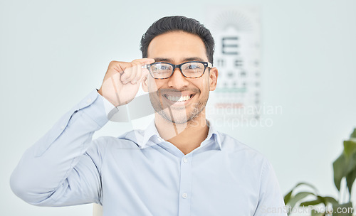 Image of Happy man, face or glasses for vision, eye exam or optometry in clinic wellness, health or prescription frames. Person, portrait or Mexican patient in optician, ophthalmology and eyesight assessment