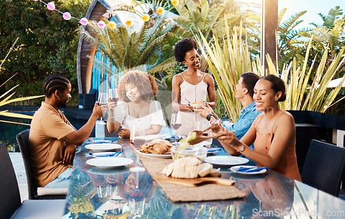 Image of Friends, food and wine outdoor at a table for social gathering, happiness and holiday celebration. Diversity, men and women group at lunch, party or reunion with drinks in garden for toast and relax