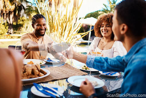 Image of Friends sharing lunch, party in garden and happy event with diversity, food and wine bonding together. Outdoor dinner, men and women at table, group of people eating with drinks in backyard in summer