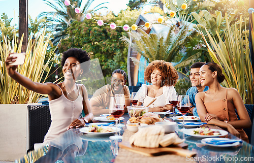 Image of Friends in selfie at lunch, party in garden and happy event with diversity, food and wine, outdoor bonding together. Photography, men and women at dinner table, people eating with drinks in backyard.