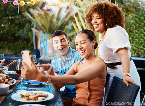 Image of Friends, food and selfie at brunch table for holiday, Christmas or thanksgiving on social media and wow or excited. Young women, man and group photography with influencer profile picture outdoor