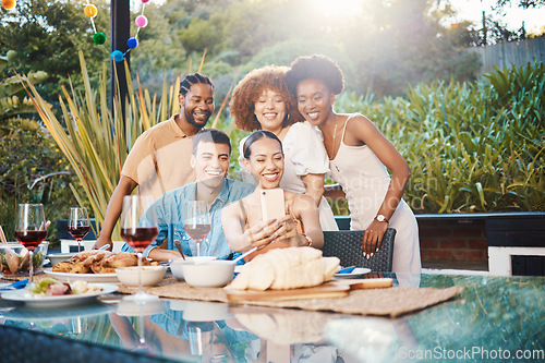 Image of Selfie, friends at dinner together in garden and happy event with diversity, food and wine for outdoor party. Photography, men and women at table, group of people with drinks in backyard at sunset.