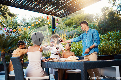 Image of Cheers, wine and friends at dinner in garden at party and celebration in diversity, food and alcohol at outdoor event. Glass toast, men and women at table, fun people with drinks in backyard together