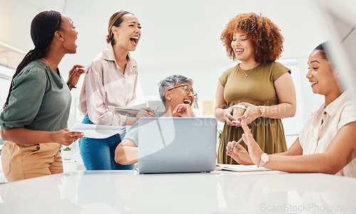 Image of Meeting, laptop and business women in discussion in the office excited for company website launch. Happy, collaboration and professional female designers in conversation with computer in workplace.