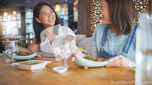 Image of Sushi, restaurant and women friends with noodles, chopsticks and fish dish. Lunch, hungry Asian female person and Chinese meal with a friend happy from bonding and eating together at a table