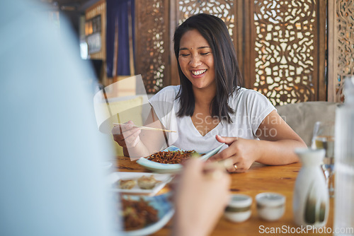 Image of Happy, lunch and a woman at a restaurant for Chinese food or bonding at a table. Smile, hungry and a girl or people at a cafe for fine dining, Asian cuisine or eating dinner or a meal together