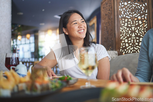 Image of Japanese woman, sushi restaurant and smile for eating, thinking and conversation for fine dining at party. Asian friends, fish and healthy with culture, traditional or fast food in diner, bar or shop