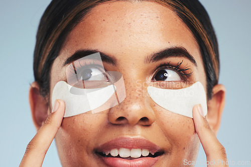 Image of Eye patch, face and woman with beauty cosmetics, dermatology and aesthetic skincare on studio background. Closeup, model and thinking of cosmetology for eyes, facial collagen and anti aging product