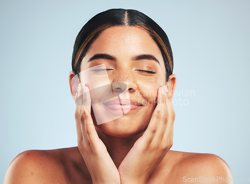 Image of Skincare, wellness and hand on face of woman in studio for cosmetology, cleaning and results on grey background. Happy, beauty and female model with cosmetic, treatment and self love satisfaction