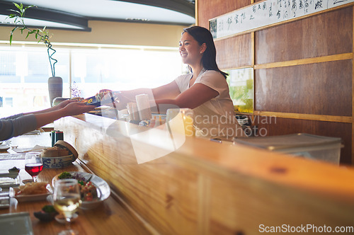 Image of Sushi serving, restaurant chef and woman with smile from food and Asian meal in a kitchen. Happy, female waiter working with lunch order with cooking and hospitality job in Japanese bar with service