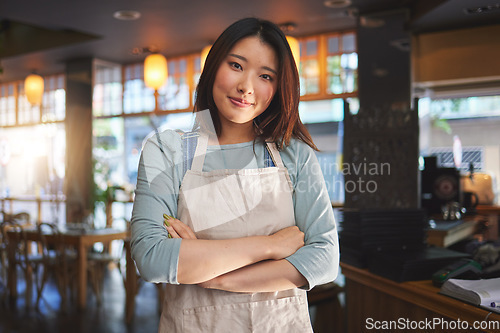 Image of Portrait, asian woman and small business entrepreneur of restaurant with arms crossed for professional service. Cafeteria server, coffee shop waitress or confident manager working in hospitality