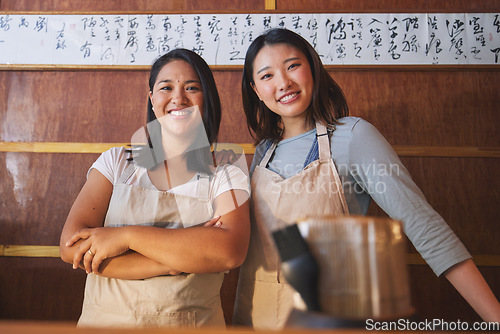 Image of Restaurant, portrait and asian women at counter together with smile, confidence and opportunity at small business. Teamwork, happiness and startup cafe owner with waitress in Japanese food store.