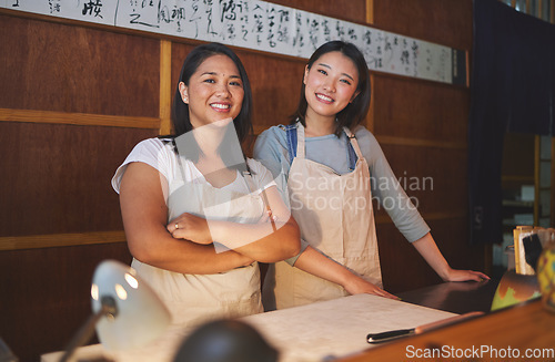 Image of Restaurant business owner, team or portrait of Asian women with smile, confidence or pride together. Collaboration, partnership or happy woman manager with leadership, waiter or server in sushi shop