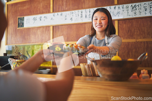 Image of Waiter, giving sushi plate and restaurant with hands, helping and catering job with customer. Seafood chef, fast food server and cooking in cafe, diner and person for order of fish, rice or seaweed