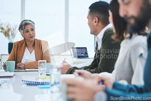 Image of CEO, mature woman or business people in meeting planning in discussion with vision or mission together. Collaboration, leadership or mentor talking about project ideas in agency to team of employees