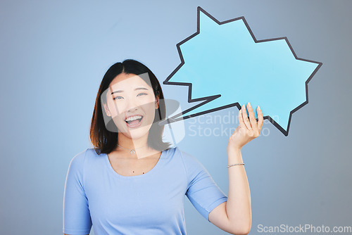 Image of Speech bubble, woman voice and student presentation, chat or communication for college opportunity or forum. Portrait of asian person with opinion, feedback or mockup poster on blue studio background