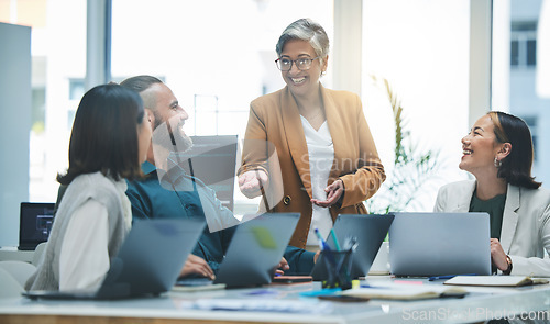 Image of Happy people, laptop and meeting, marketing team and workflow at digital agency, creative group and research. Man, women and diversity, business and work together, senior leader and brand strategy