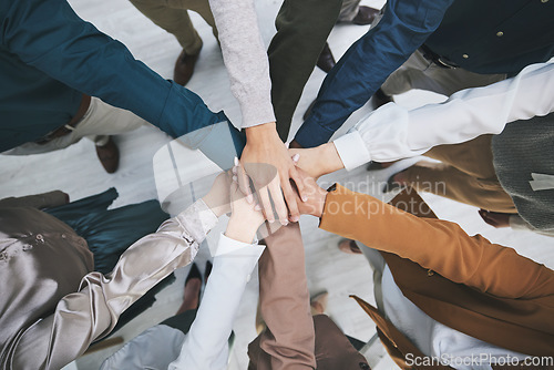 Image of Hands together, team and support, solidarity and business people with top view, stack and community. Synergy, cooperation and huddle, collaboration and corporate group with trust, meeting and mission