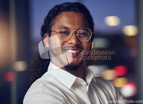 Image of Happy, night and portrait of business man in office for professional, manager and accountant. Pride, corporate and smile with face of employee in Indian agency for finance, consulting and economy