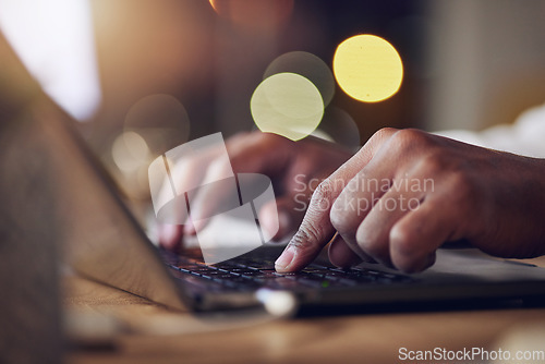 Image of Laptop keyboard, hands and night person typing, copywriting or working late on social media content writing. Closeup, dark office and writer editing online article, information or creative essay