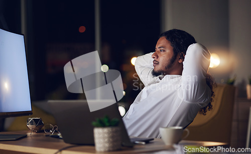 Image of Thinking, night and a business man in his office to relax or finish a task for project management or future growth. Vision, mindset and a corporate employee planning in a professional workplace