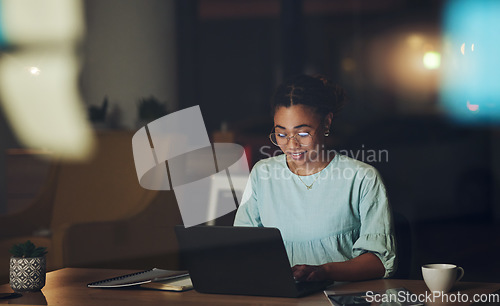 Image of Business woman, night and planning with laptop, typing or reading for proposal, goal or deadline for report. Entrepreneur, computer and web design for seo, thinking or brainstorming in dark workplace