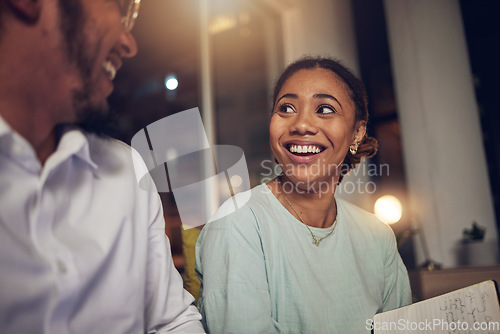 Image of Night, man and woman with conversation, business and brainstorming with planning, ideas and discussion. people, coworkers and staff working late, deadline and notebook with teamwork and collaboration