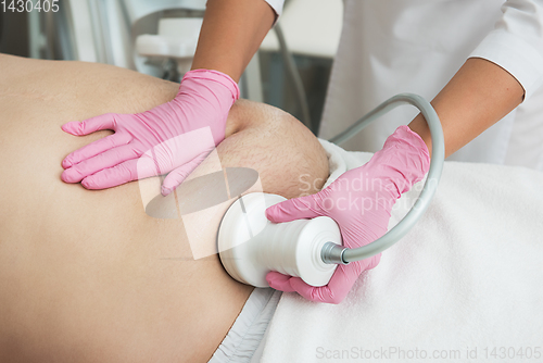 Image of Belly cavitation at modern beauty clinic