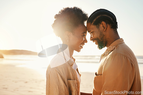 Image of Beach sunset, forehead and happy black couple bonding, connect and enjoy relax summer vacation together. Love, flare and African people support, care and affection on holiday, outdoor date or travel