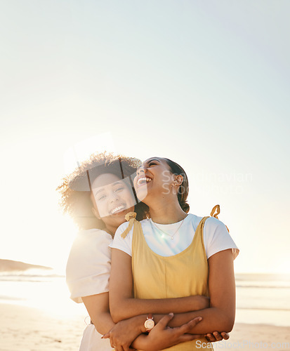 Image of Portrait, laughing and gay couple hugging on the beach together for romance or bonding on a date. Mockup, sunset and an lgbt woman with her lesbian girlfriend by the sea or ocean for their honeymoon