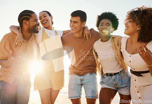 Image of Summer, relax and hug with friends at beach for freedom, support and sunset. Wellness, energy and happy with group of people laughing by the sea for peace, adventure and Hawaii vacation together