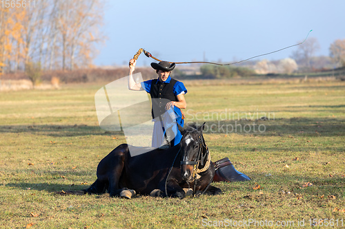 Image of Hungarian csikos horseman in traditional folk costume