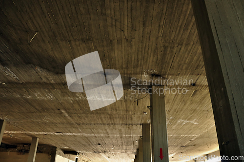 Image of concrete ceiling and pillars in abandoned factory