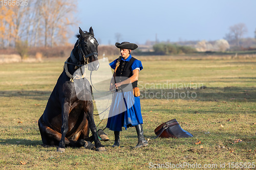 Image of Hungarian csikos horseman in traditional folk costume