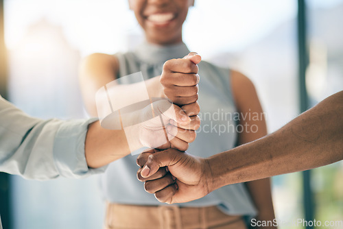 Image of Fist bump stack, support or business people for motivation, teamwork or mission in collaboration. Partnership, hands closeup or employees meeting in huddle with goal, vision or solidarity together