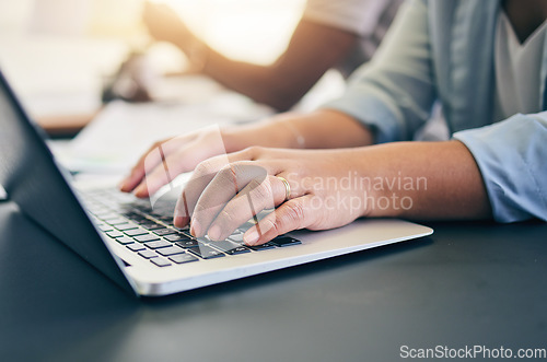 Image of Laptop, keyboard and closeup of woman typing for online research for a project in the office. Technology, hands and female person working on a computer for a creative startup business in a workplace.