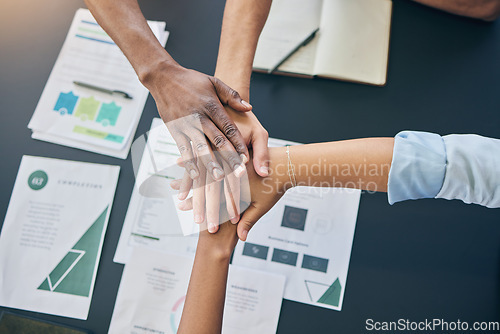 Image of Hands stack, business people and documents top view, teamwork and planning at startup, office and group. Team building, goals and synergy with link, connection and paperwork for circle in workplace