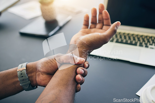 Image of Closeup of a businessman with wrist injury, pain or accident in the office with carpal tunnel. Medical emergency, arthritis and male person with nerve, muscle or joint sprain in his arm in workplace.
