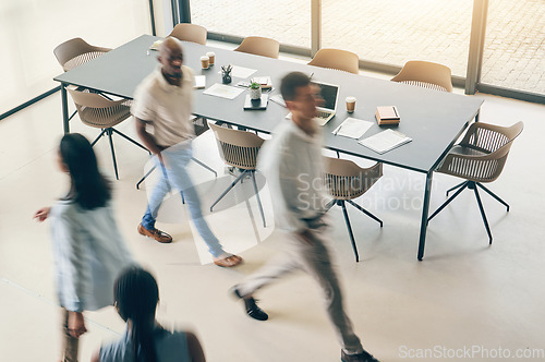 Image of Above, busy office and fast walking business people for corporate career, moving and speed. Blur, morning and diversity of employees in the workplace together for a professional company in motion