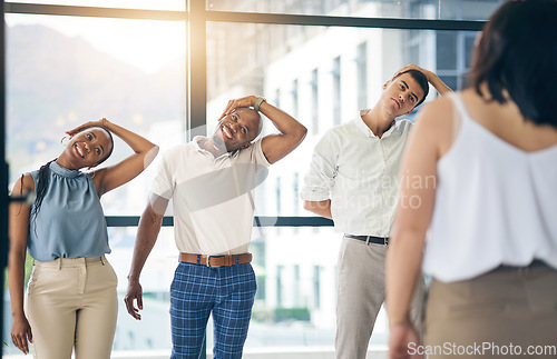 Image of Exercise, stretching and a group of business people in the office to workout for health or mobility together. Fitness, wellness and training with an employee team in the workplace for a warm up