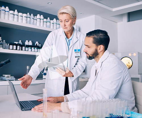 Image of Scientist, mentor and training on computer and tablet for data analysis, laboratory report and pharmaceutical research. Science or medical woman and man talking, medicine support and digital solution