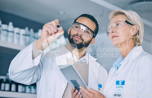 Image of Tablet, science formula and a team writing on glass in the laboratory for planning on innovation. Healthcare, medical and scientist doctors in a lab to study research together for future development