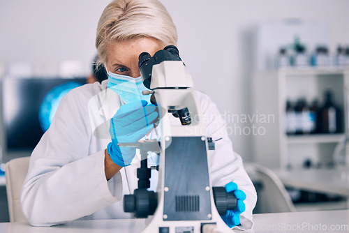 Image of Microscope, senior woman and science check with vaccine research for a pharmaceutical or medical study. Chemistry, biometric and molecule analytics for particles and virus investigation in a hospital