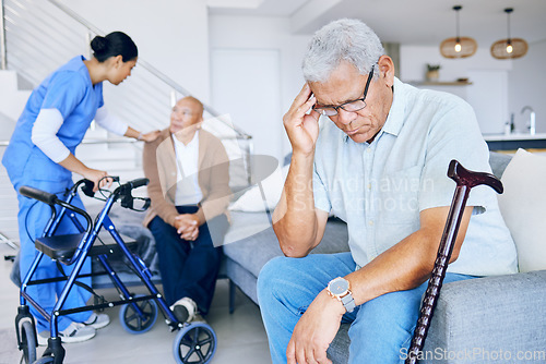 Image of Healthcare, doctor and a man with a headache in a nursing home, depression or consultation. Talking, help and a nurse with elderly people for support with a migraine, retirement stress or sick