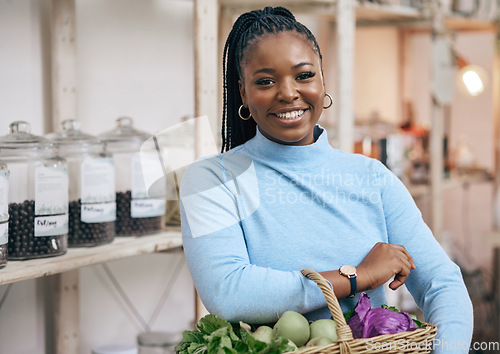 Image of Black woman, face and shopping basket with vegetables, healthy food and diet produce in local grocery store. Smile, portrait and African customer or nutritionist in retail supermarket for fruit sales