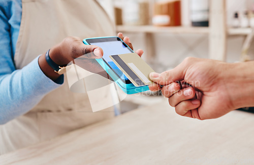 Image of Credit card, payment screen and hand with store cashier, machine and transaction in a retail shop. Discount, ecommerce and shopping with electronic pay, fintech and customer with purchase and tech