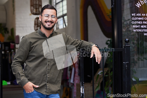 Image of Happy, man or portrait in clothes store, fashion workshop or thrift shop in owner pride. Smile, confident or professional designer in clothing small business, retail and second hand donation industry