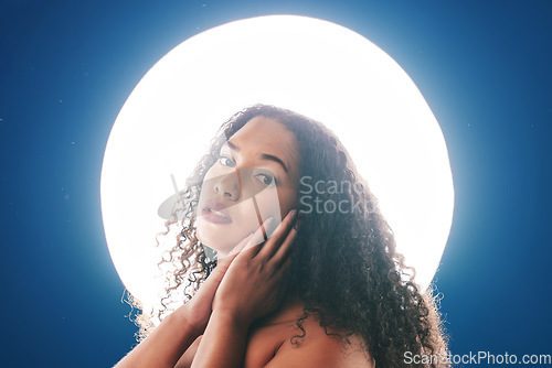 Image of Beauty, neon light and portrait of woman with makeup for wellness, cosmetics and facial care in studio. Circle, creative spa and face of person for art deco, glamour and aesthetic on blue background