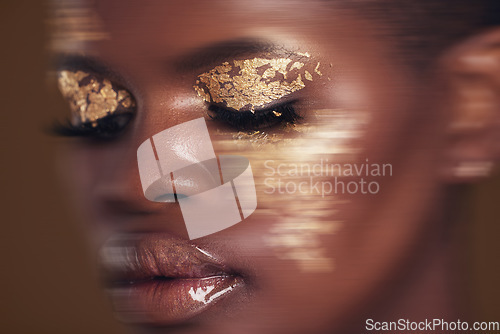 Image of Gold beauty, blurred and black woman with face closeup with makeup and cosmetics in studio. Brown background, African female model and glitter with golden shine and glow from facial paint sparkle